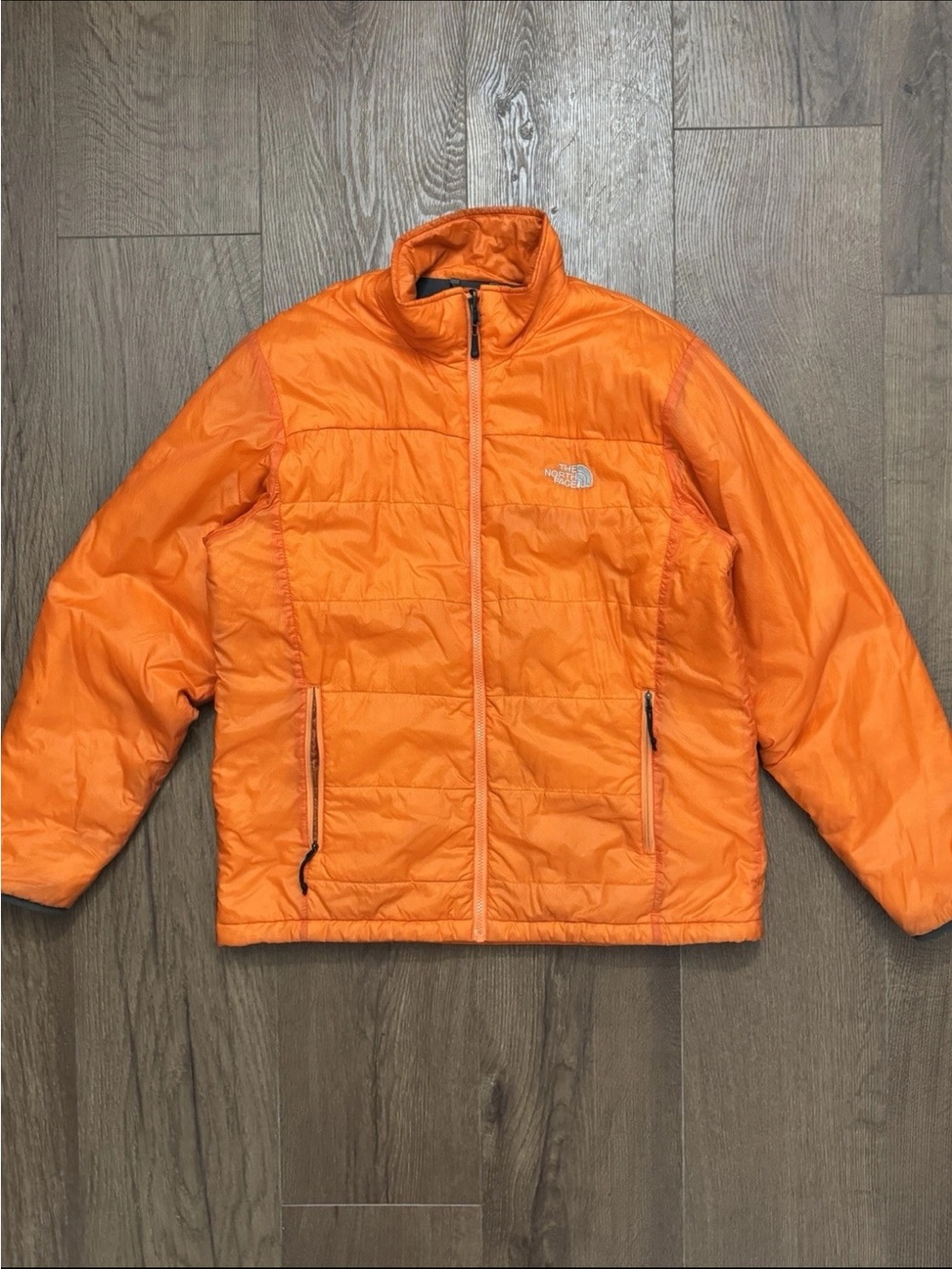 The North Face Orange Puffer Jacket